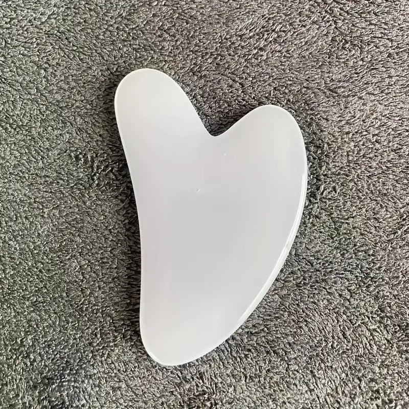 Racloir massage visage